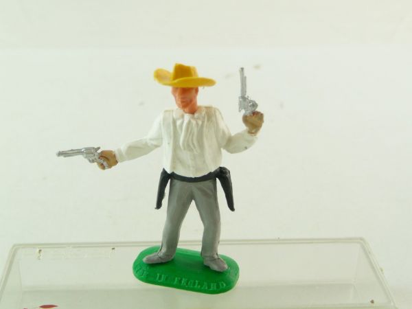 Timpo Toys Cowboy 2 Pistolen schießend, dunkelgelber Hut, weißes Hemd