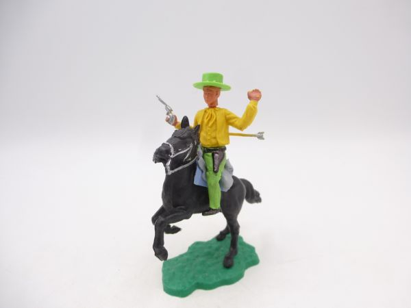 Timpo Toys Cowboy 1. Version (gelb) von Pfeil getroffen