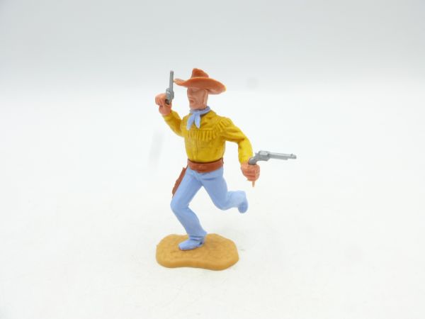 Timpo Toys Cowboy laufend, 2 Pistolen wild schießend