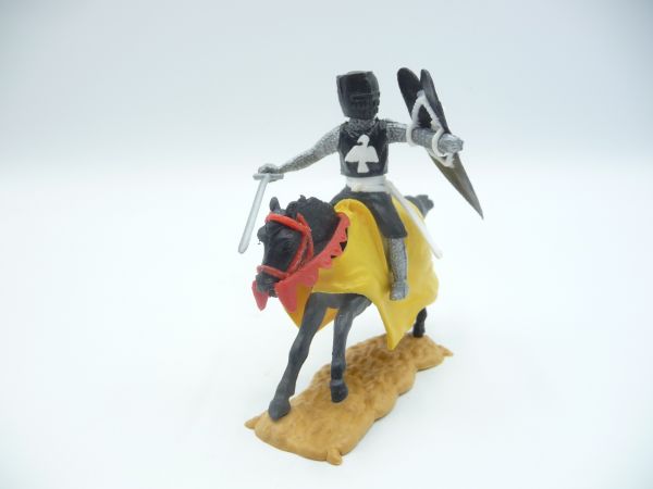 Timpo Toys Medieval knight on horseback, black and white with sword - loops ok