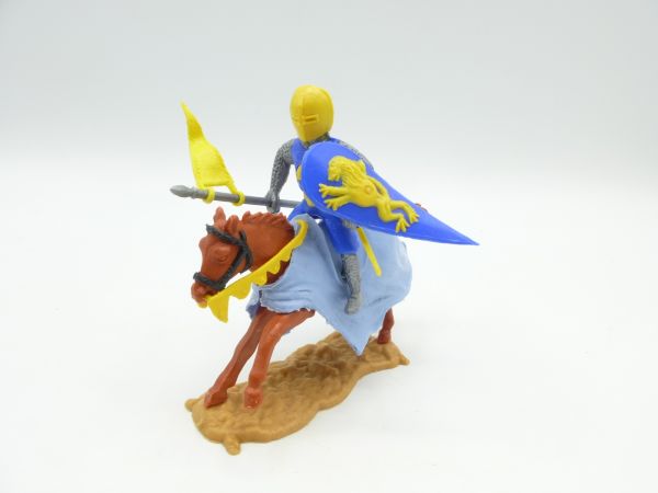 Timpo Toys Mittelalterritter reitend, blau/gelb mit Schwert