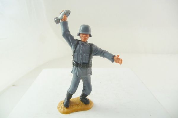 Timpo Toys German soldier, throwing grenades, fixed helmet