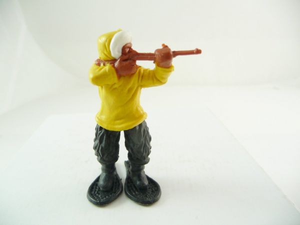 Timpo Toys Eskimo mit kurzem Gewehr schießend, gelb, Beine schwarz
