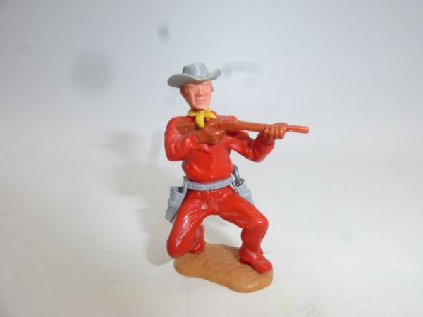 Timpo Toys Cowboy 3rd version crouching with short rifle, red