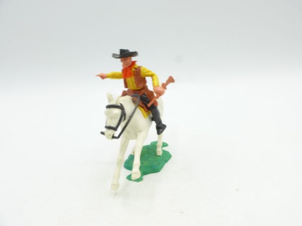 Timpo Toys Cowboy 2nd version riding with gun, pointing