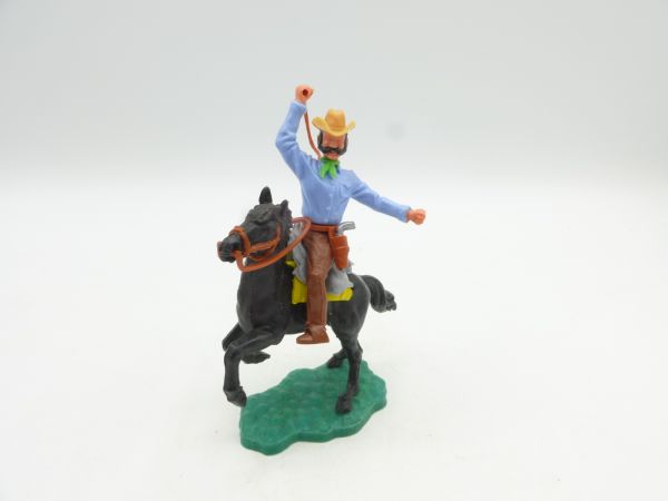 Timpo Toys Cowboy reitend mit Peitsche