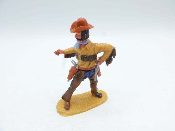 Timpo Toys Cowboy 4. Version stehend mit Fransenhemd, blaue Hose