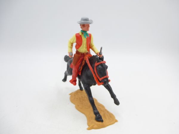 Timpo Toys Cowboy 3. Version reitend mit 2 Pistolen
