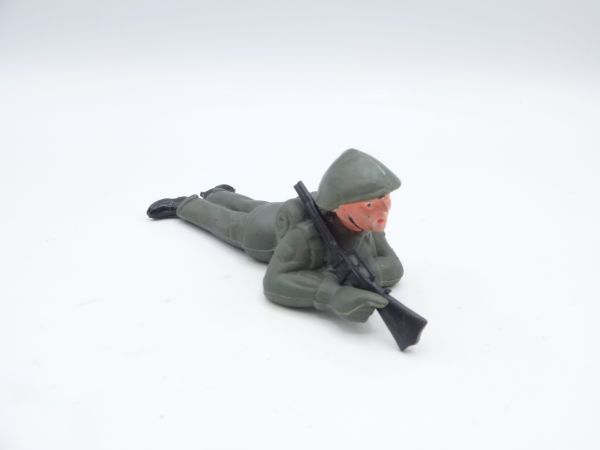 Soldier lying with rifle - loose, not original