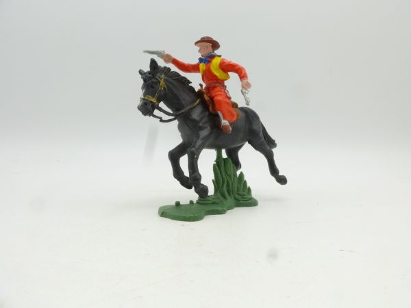 Britains Swoppets Cowboy riding with 2 pistols (made in HK)