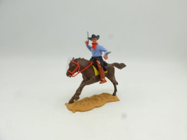 Timpo Toys Cowboy 2nd version riding, shooting 2 pistols wildly