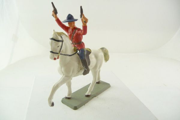 Starlux Mountie riding, firing with 2 pistols in the air