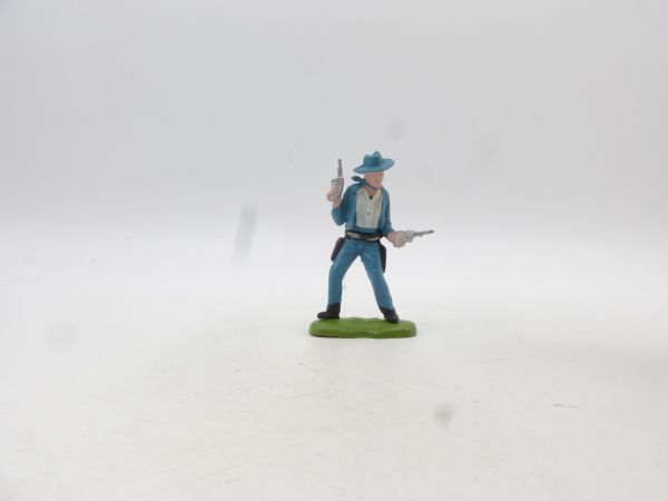 Britains Swoppets Cowboy standing with 2 pistols, light blue (made in HK)