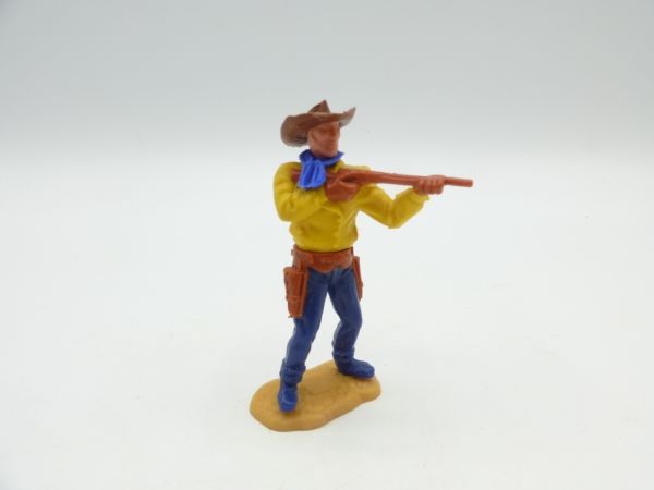 Timpo Toys Cowboy 2. Version stehend mit kurzem Gewehr schießend