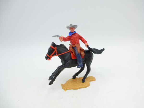 Timpo Toys Cowboy 2nd version riding with pistol + money bag