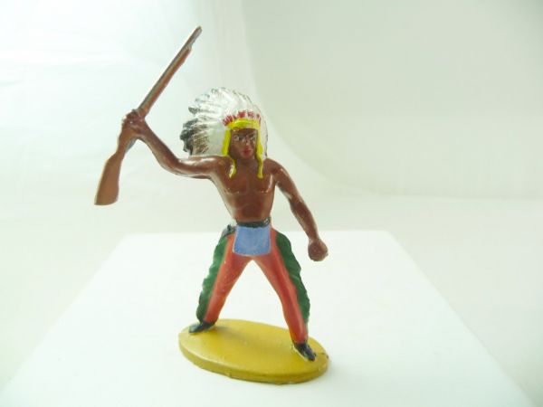 Merten 6,5 cm Indian standing, holding up rifle