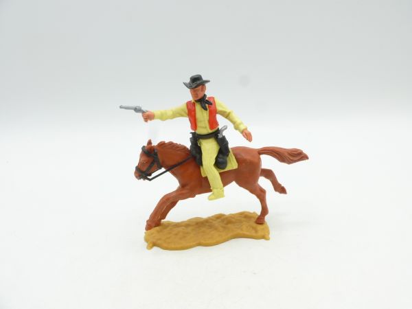 Timpo Toys Cowboy 3rd version on horseback, shooting pistol