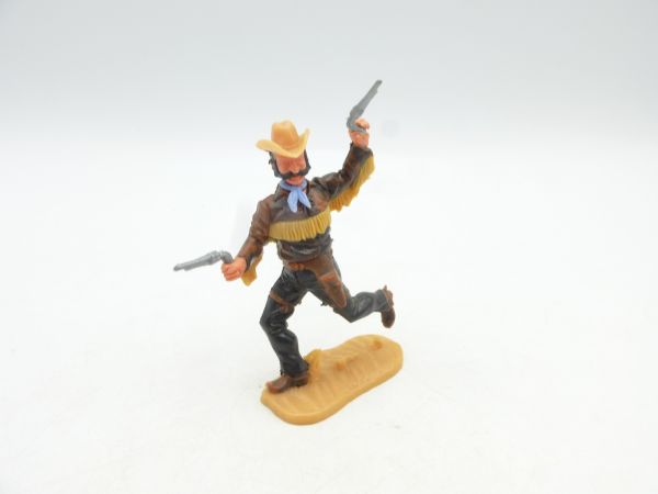 Timpo Toys Cowboy 4. Version laufend, 2 Pistolen wild schießend