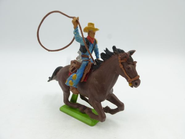 Britains Deetail Cowboy riding with lasso - great colour combination