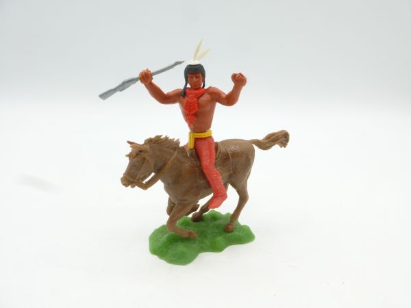 Crescent Indian riding, holding up rifle