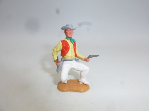 Timpo Toys Cowboy 3. Version (großer Kopf) hockend mit 2 Pistolen