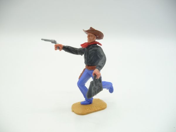 Timpo Toys Cowboy 2. Version laufend mit Pistole + Geldtasche