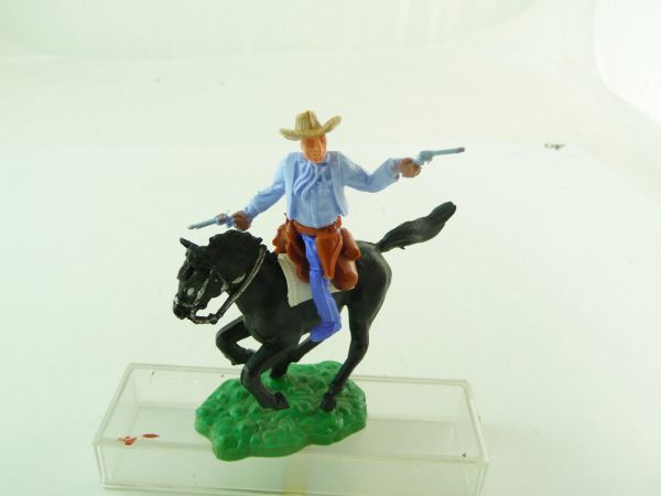 Timpo Toys Sheriff reitend mit 2 Pistolen, Oberteil hellblau