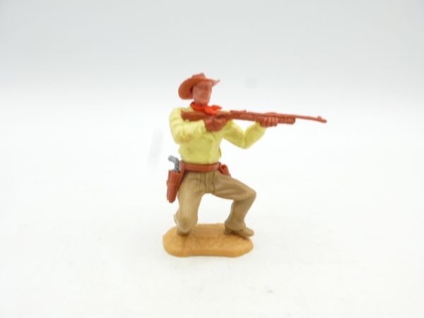 Timpo Toys Cowboy 2. Version hockend Gewehr schießend