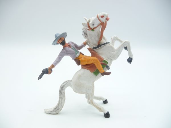 Merten Bandit riding, firing pistol - rare colour