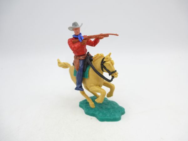 Timpo Toys Cowboy 2. Version reitend, Gewehr schießend