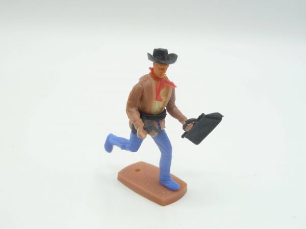 Plasty Cowboy laufend mit Pistole + Geldtasche