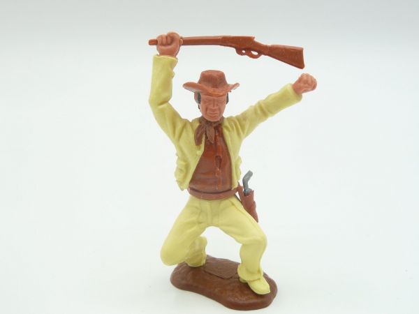 Timpo Toys Cowboy 2. Version hockend mit seltenem Oberteil - tolle Farbkombi