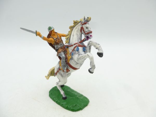 Normanne auf aufsteigendem Pferd mit Schwert + Schild