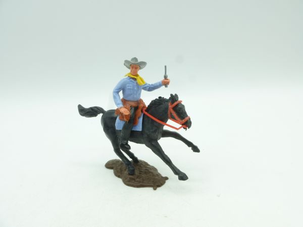 Timpo Toys Cowboy 2nd version riding, gun high