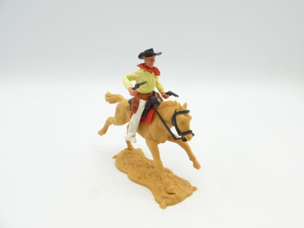 Timpo Toys Cowboy 2. Version reitend, 2 Pistolen schießend, weißes Unterteil