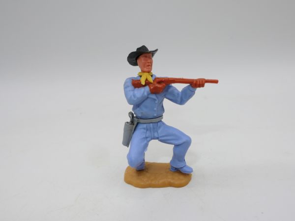 Timpo Toys Cowboy 2. Version hockend mit kurzem Gewehr (original), hellblau