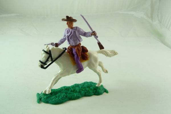 Timpo Toys Cowboy 1. Version (kleiner Hut), reitend mit Gewehr u. Pistole