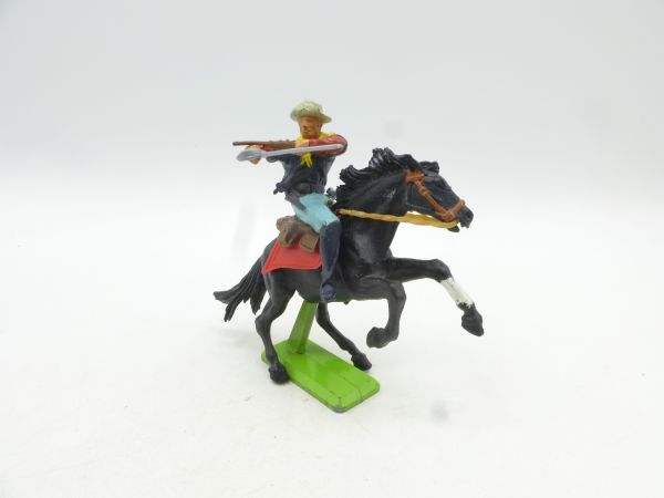 Britains Deetail Soldier 7th cavalry riding, rifle firing over sabre