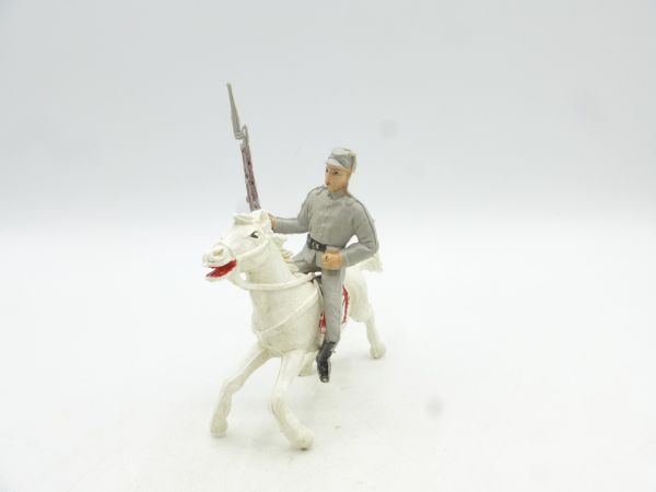 Jackson Southerner on horseback, rifle sideways