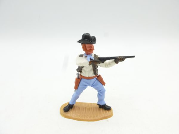 Timpo Toys Cowboy 4. Version stehend mit kurzem Gewehr schießend