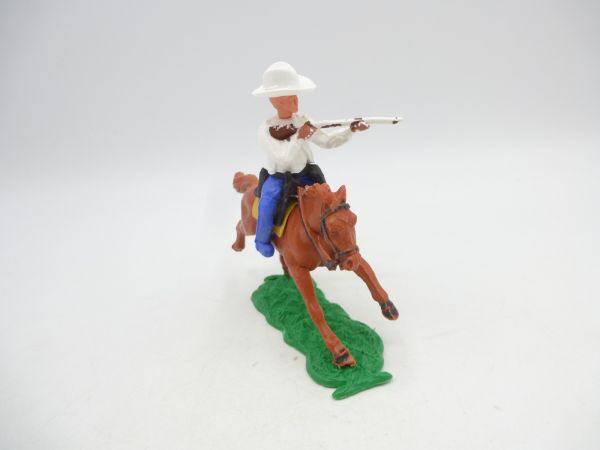 Timpo Toys Cowboy 1. Version (Steckhut weiß), Gewehr schießend