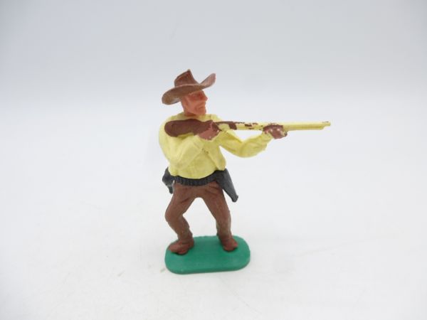 Timpo Toys Cowboy 1. Version, hellgelb, Gewehr schießend
