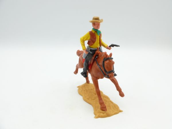 Timpo Toys Cowboy 3. Version reitend mit 2 Pistolen (schwarze Pistolen)