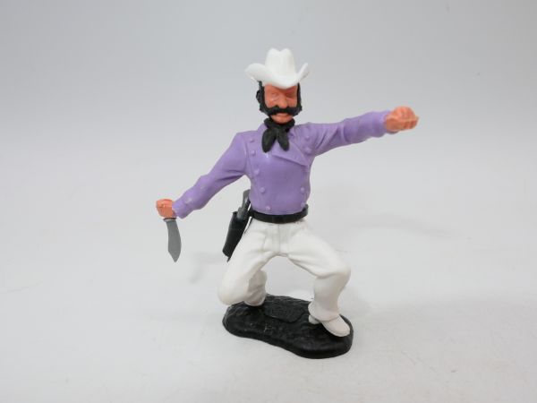 Timpo Toys Cowboy 3rd version crouching with knife - great colour combination