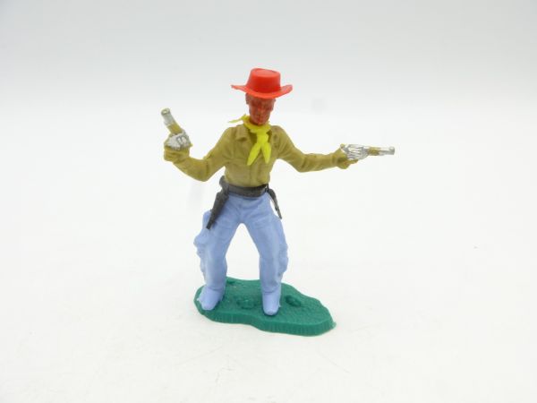 Lone Star Cowboy standing, shooting 2 pistols wildly