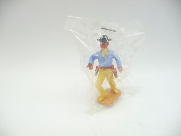 Timpo Toys Cowboy 3rd version running with 2 pistols - in original bag