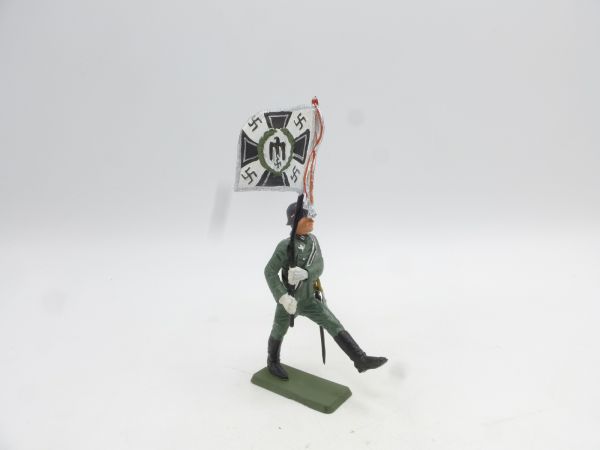Starlux Soldier in goose step with flag - rare, great condition
