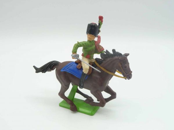 Britains Deetail Waterloo; soldier riding, green/red, holding sabre down, looking to the right