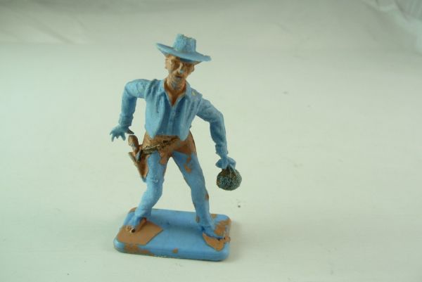 Crescent Cowboy standing with moneybag, pulling pistol, C3
