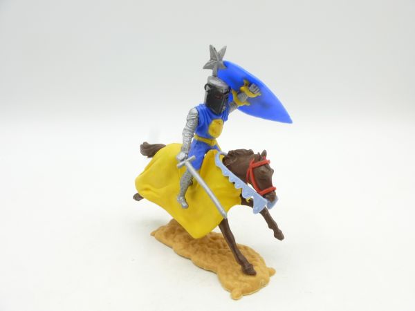 Timpo Toys Visor knight riding with sword, medium blue